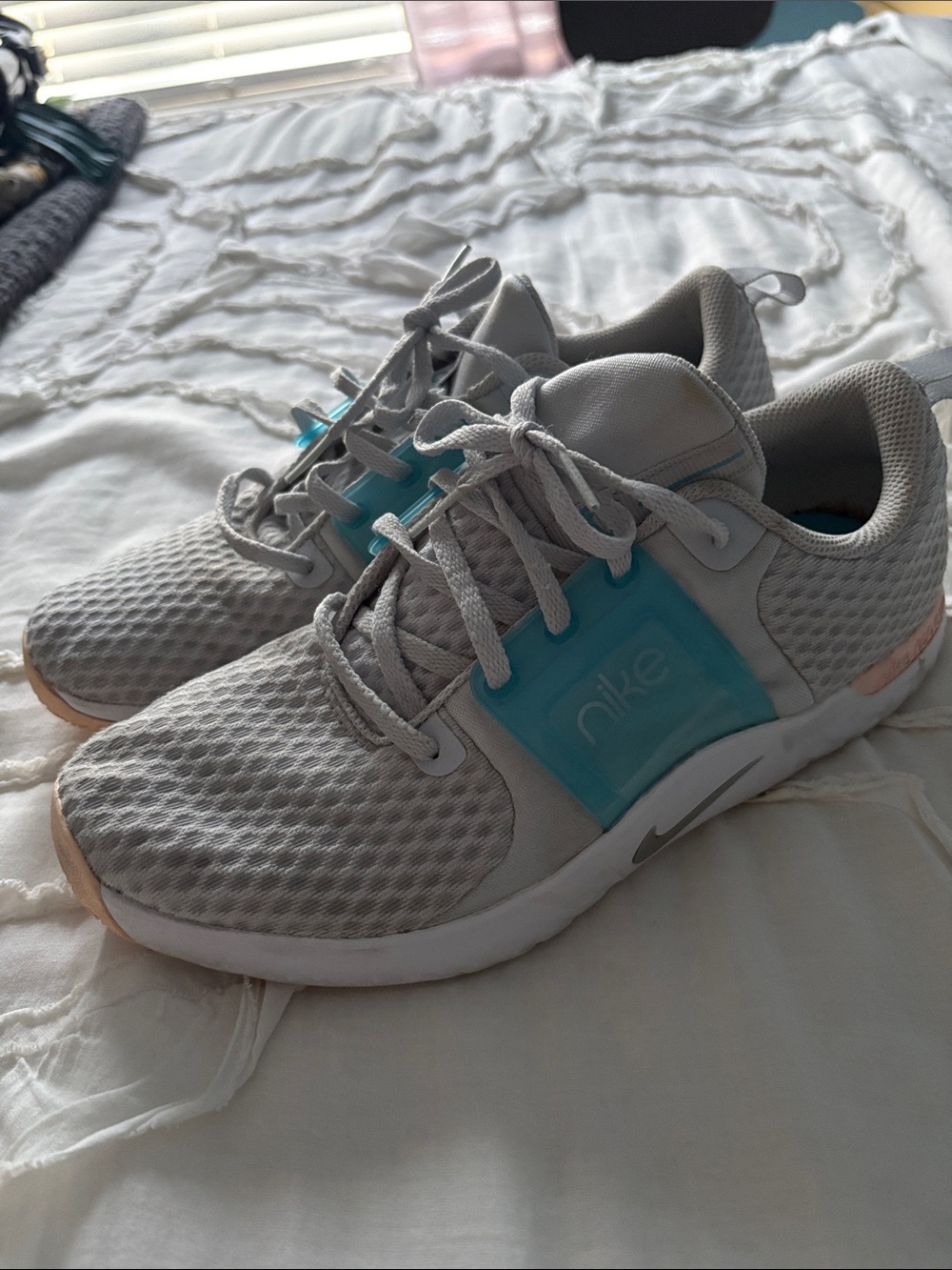 Nike Women’s Light Gray Athletic Sneakers with Teal Accent